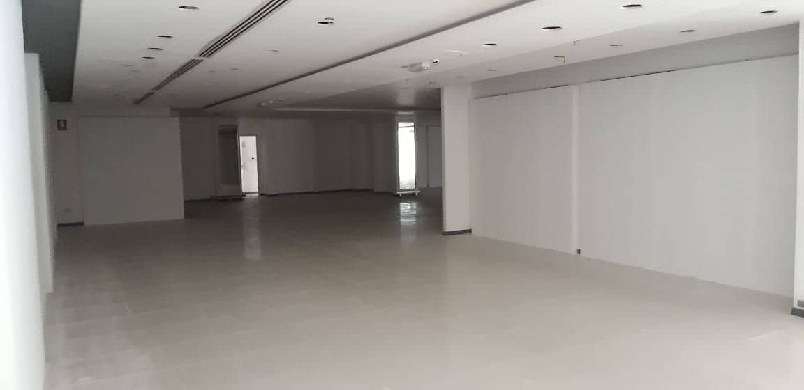 21000 Sq ft Showroom Space with mezzanine available in Al Qasimiya area. .