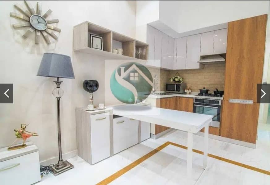 7 Burj View ! High Quality 1BR Converted into 2BR ! Motivated Seller