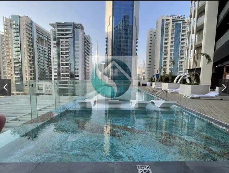 11 Burj View ! High Quality 1BR Converted into 2BR ! Motivated Seller