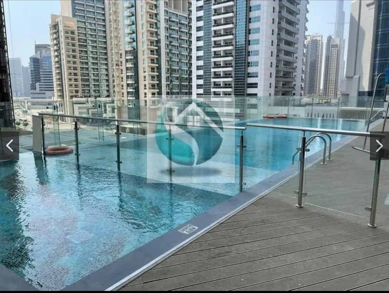 17 Burj View ! High Quality 1BR Converted into 2BR ! Motivated Seller