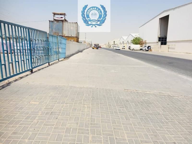 8DHS /sqft open yard with boundary wall in Industrial area 18 Sharjah.