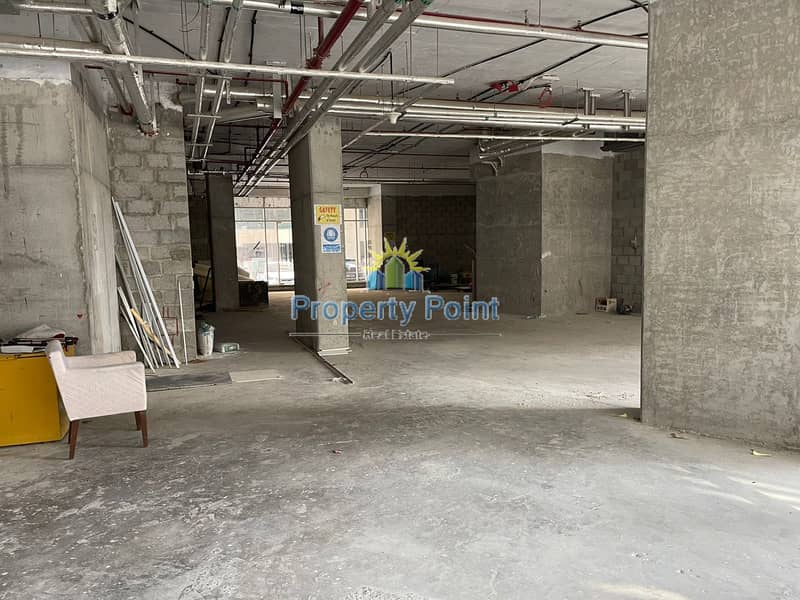 437 SQM Shop for RENT | New Tower | Spacious Open Layout | Shell & Core | Corniche Area