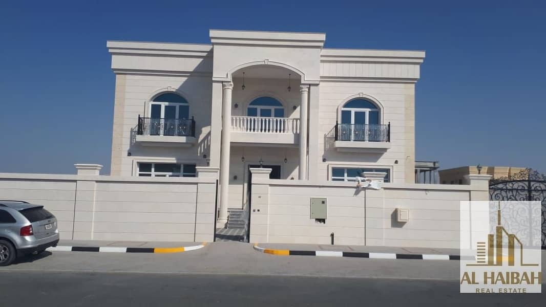 For sale a new two-storey villa with a very luxurious stone facade, Al Hoshi area
