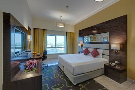 شقة فندقية 2 غرفة نوم للايجار في مدينة دبي للإنتاج، دبي - Bedroom 1
