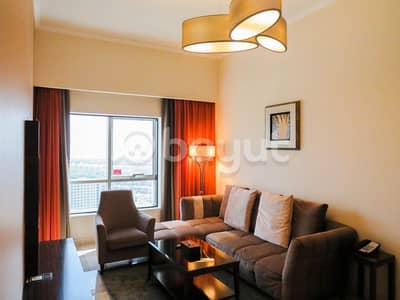 2 Bedroom Hotel Apartment for Rent in Dubai Production City (IMPZ), Dubai - Monthly Rates are available for two bedroom starting from AED 7499 at the 5 star Ghaya Grand Hotel