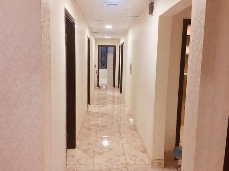 Large apartment 3 rooms and a hall for rent Al Nuaimiya Towers with a maid  room area of ​​2366 feet on Kuwait Street  near of Sheikh Mohammed b