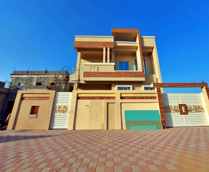 For sale in Ajman, Jasmine, villa with excellent view on the neighboring street, modern facade, excellent finishing