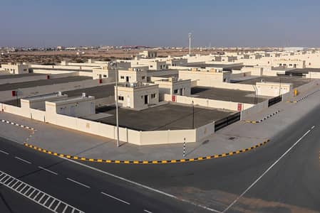 Plot for Rent in Emirates Industrial City, Sharjah - Brand new Open Yard with 2 Offices, etisalat, pantry, toilet, electricity, civil defense.
