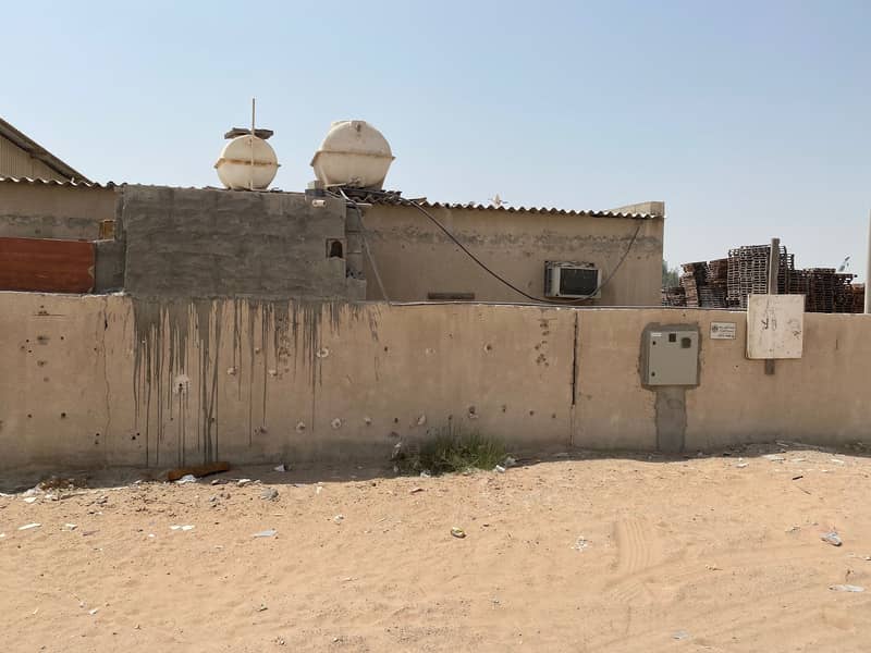 land with electricity on  large street in Saja'a