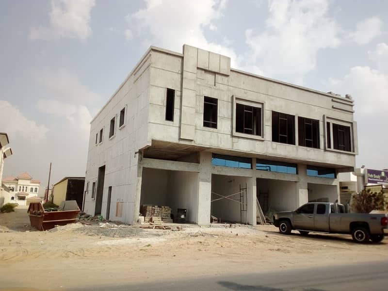 For sale residential and commercial building in Al Rawda under construction