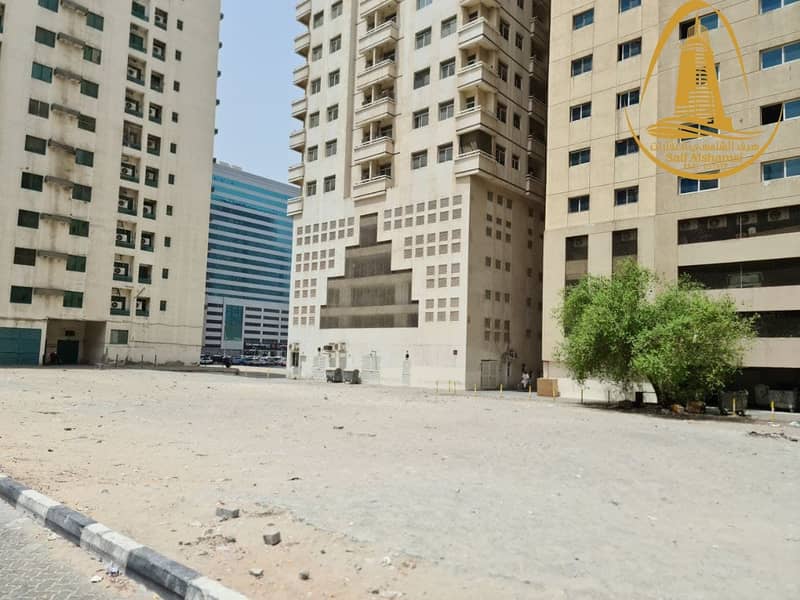 FOR SALE A COMMERCIAL LAND IN AL NAHDA AREA