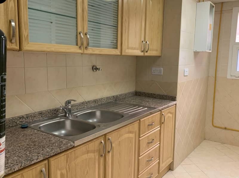 7 on four payments flats for rent 2 bedrooms with 2 bathrooms  located in mussafah shabiya ME_12