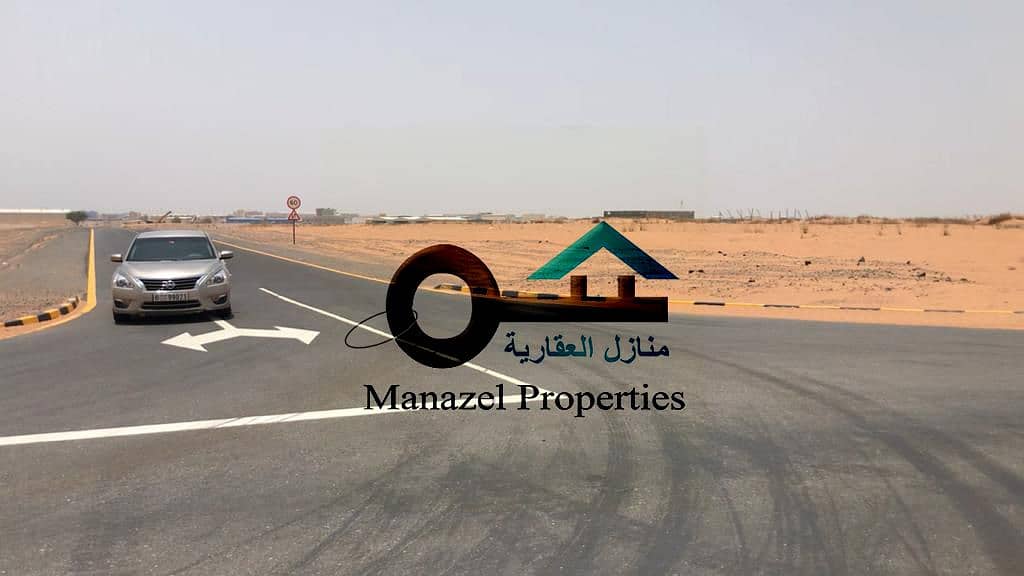 A plot of land for sale in Umm Al Quwain in the Umm Al Thuob Industrial Area, the second piece of the main street, large areas for the work of giant f