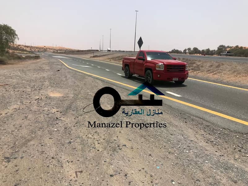 A plot of land for sale in Umm Al Quwain in the Umm Al Thuob Industrial Area, large areas for the work of giant f