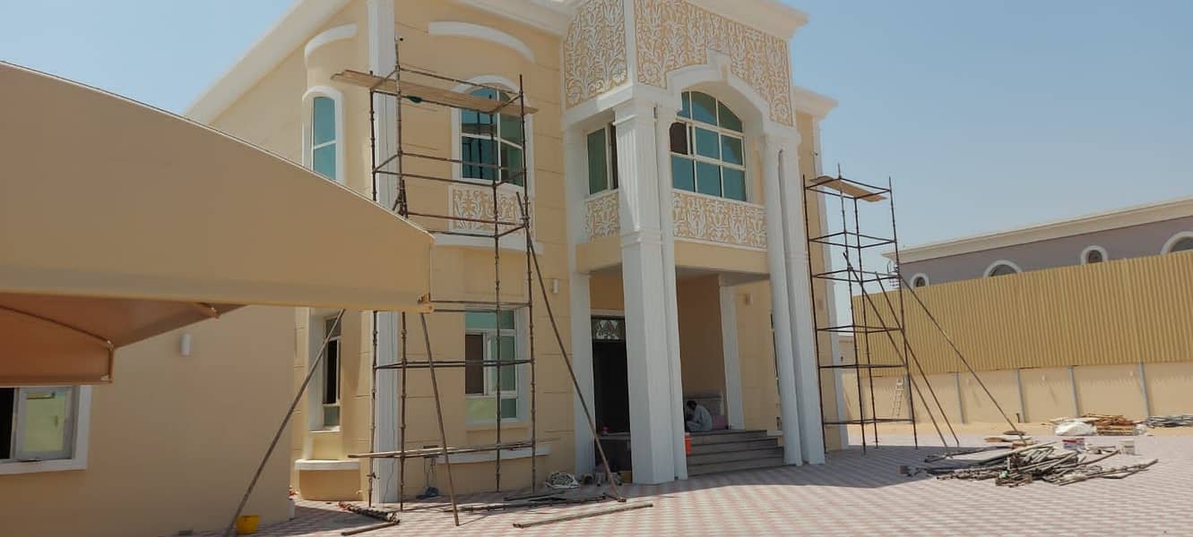 BRAND NEW ~ 5 bedroom hall villa for rent in Al Rahmaniya 6