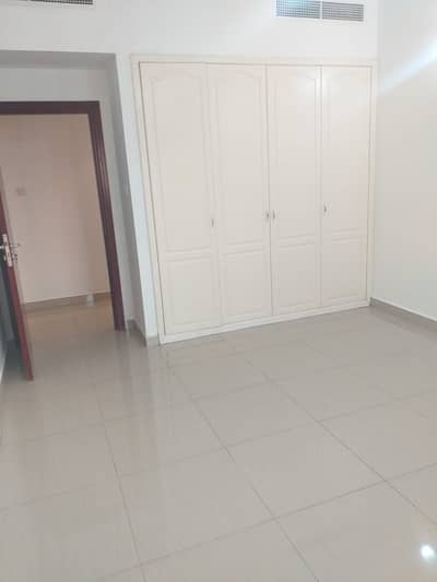 فلیٹ 2 غرفة نوم للايجار في بر دبي، دبي - شقة في بناية روز 1 المنخول بر دبي 2 غرف 60000 درهم - 4327927