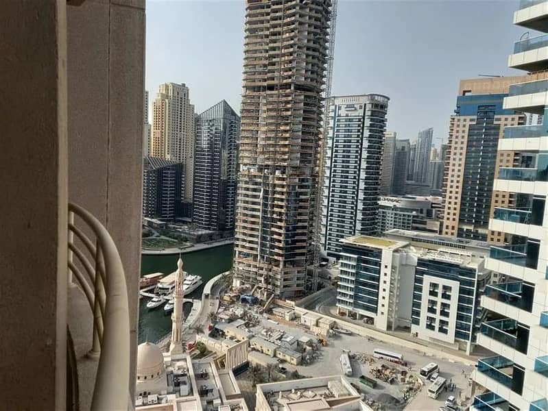 With Partial marina and Sheikh zayed view . . . Vacant 2 Bedroom With Balcony In Manchester Tower  . . .