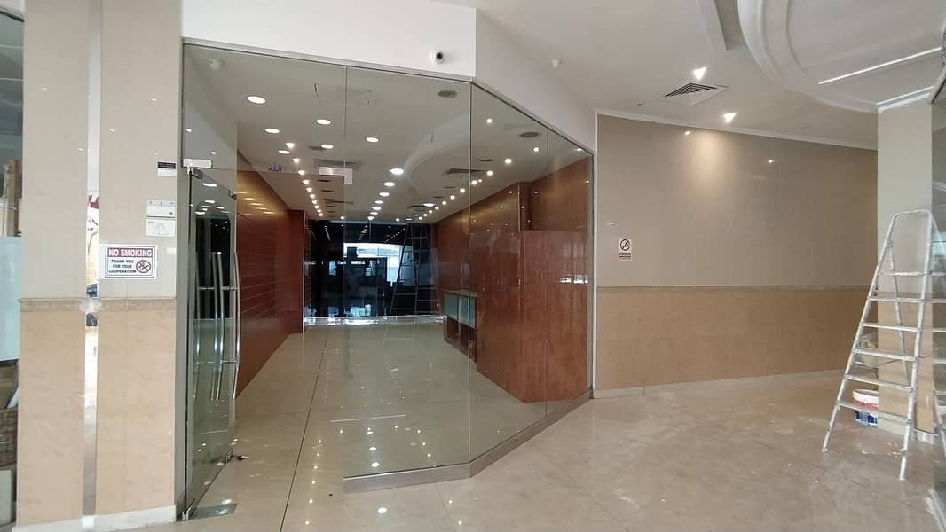 Spacious 550 Sq. Ft Retail / Office Space Available with Free Central A/C | Al Shorafa Tower 1 | Rumaila 3 | AJMAN