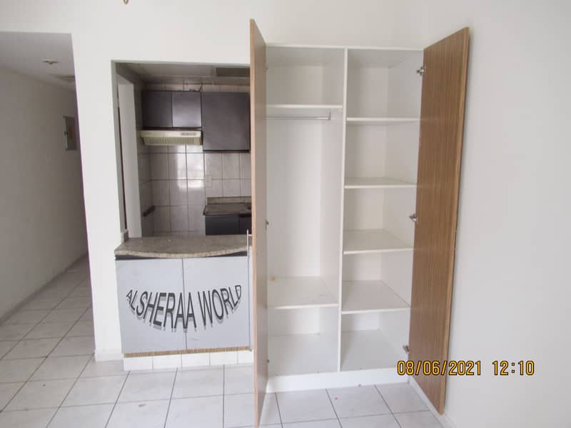 2 CENRAL AC FLAT AVAILABLE IN AL RAFFA WITH  WARDROBES . FIRST COME  FIRST PARKING