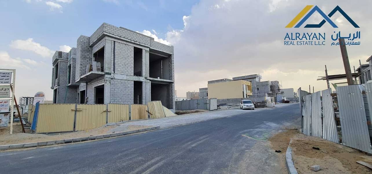 Corner land for sale in Alia Ajman, freehold of all nationalities, and all fees included