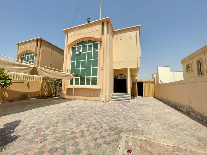 The location of the villa in Ajman, Al-Rawda area, two floors, Arabic design, with the possibility of easy bank financing