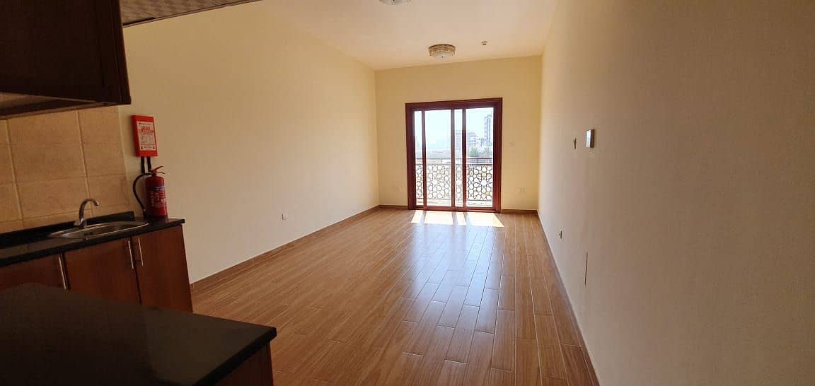 2,Larg studios| with balcony|For Sale in Warsan 4th on low floor