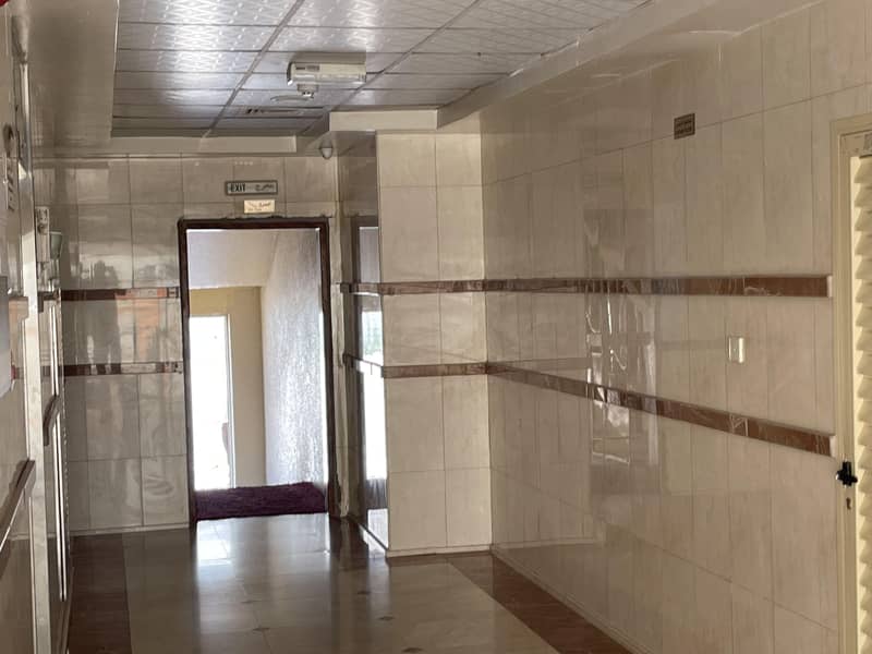 Two-bedroom apartment and a central hall in Al Nuaimiya, a large area