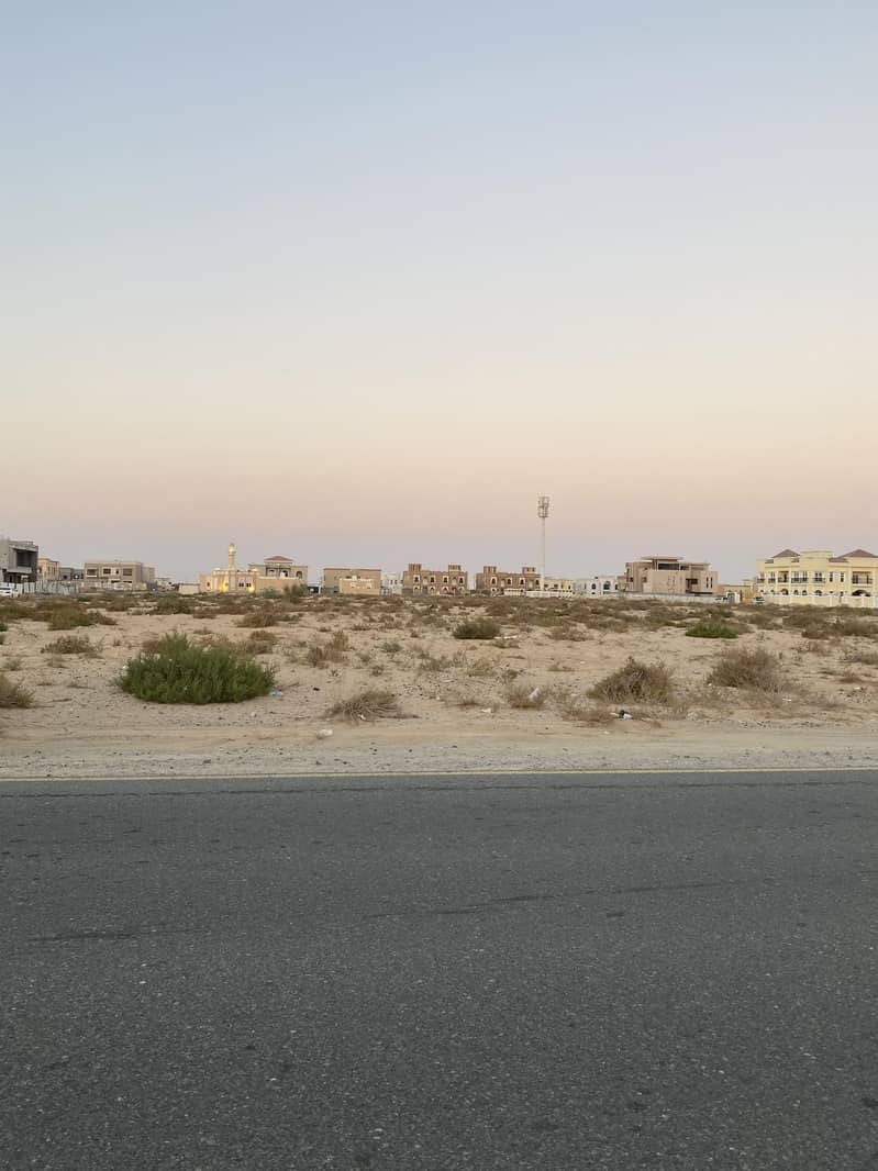 for sale a big residential plot in alhoshi the price is best in the market and location is very good