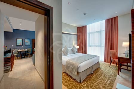 شقة فندقية 2 غرفة نوم للايجار في الخليج التجاري، دبي - Bedroom