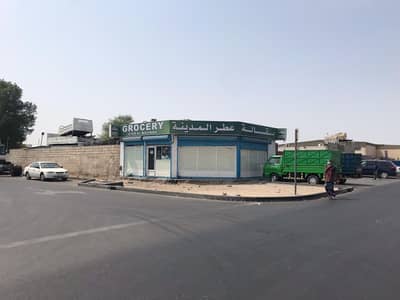 Industrial Land for Sale in Industrial Area, Sharjah - For sale a walled land in industrial area Ten -Sharjah - a strategic location