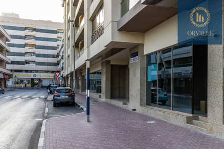 طابق تجاري  للايجار في الكرامة، دبي - طابق تجاري في مبنى الكرامة الجديد الكرامة 200000 درهم - 5297344