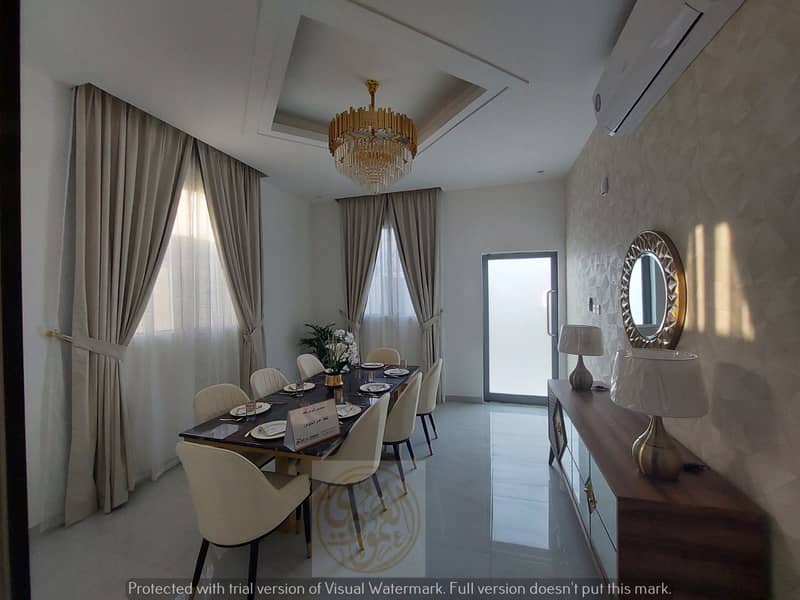Without down payment, one of the most luxurious villas in Ajman, ready to live, with air conditioners and furniture, with a building area and very lar