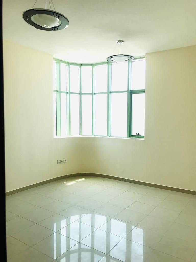 ONE MONTH FREE AC FREE 2 BHK APARTMENT WITH BALCONY AVAILABLE IN 30 K  PARKING FREE IN AL NAHDA SHARJAH