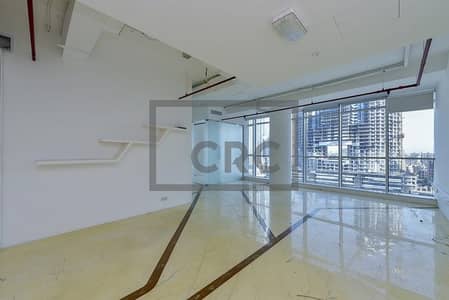 Office for Sale in Business Bay, Dubai - Rented | Burj Khalifa | Fitted Partition