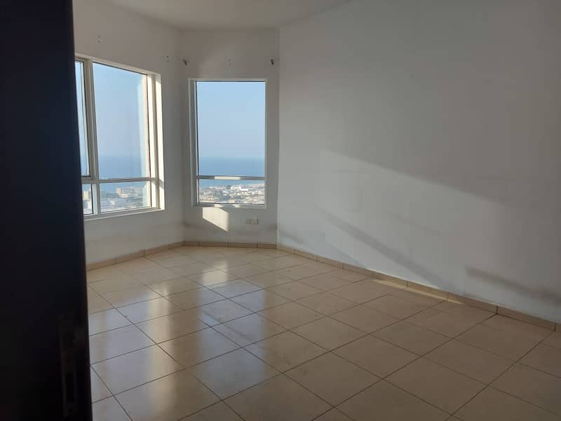 An apartment is available for sale in a clean tower on the Corniche Street, Al Khan area