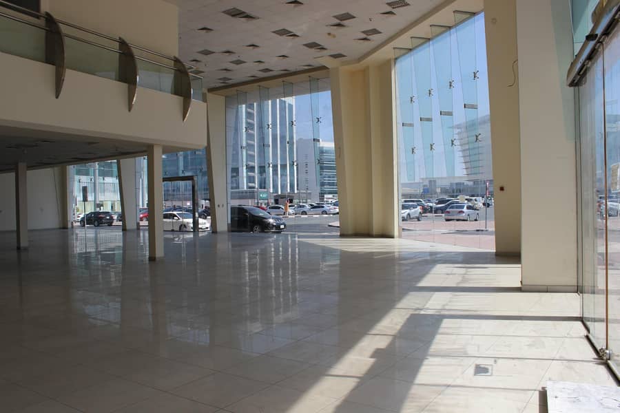 Large Corner  Showroom For Rent Near DNATA high visibility