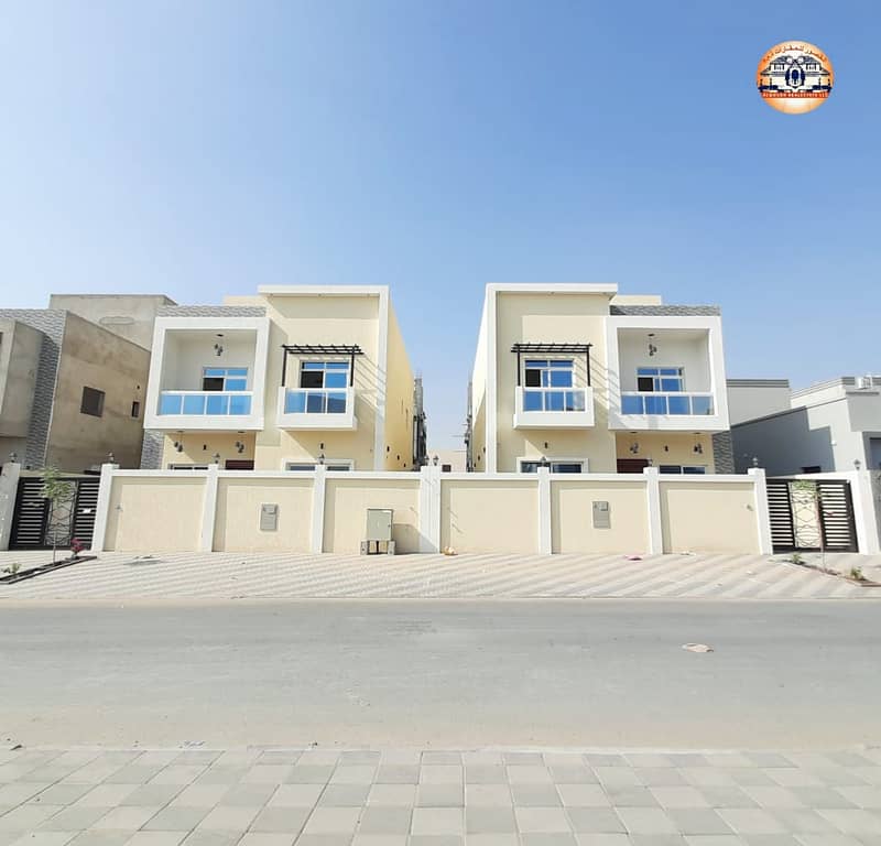 The location of the villa in Ajman, the Jasmine area, two floors and a roof on a direct street, central air conditioning, modern design, various finis