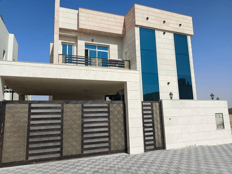 For sale villa in Al-Amrah area in Ajman new freehold super deluxe finishing