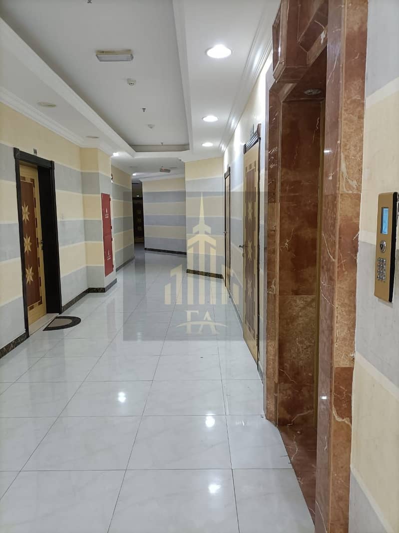 GRAB THE DEAL NEW BUILDING 1 BEDROOM /HALL APARTMENT ONE MONTH FREE FOR RENT ,AL RAWDA 2 AJMAN 19,000/- YEARLY