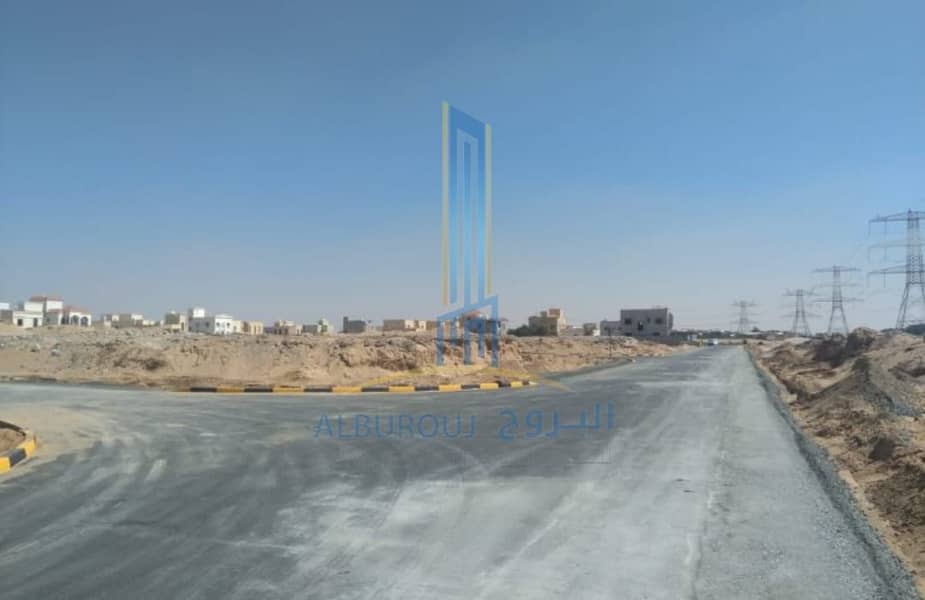 A residential plot for sale in Al Manama11