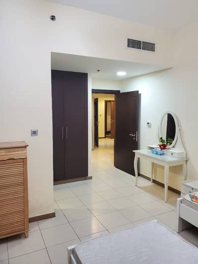 2 Bedroom Flat for Sale in International City, Dubai - large corner unit 2BHK with balcony semi furnished  in indigo spectrum for sale 820k