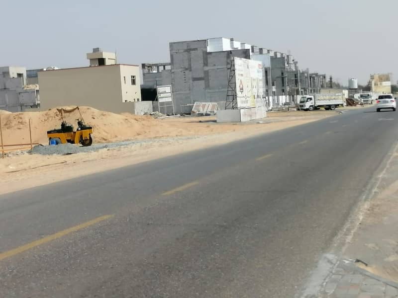 A plot of land for sale in Al Zahia residential area, ground + first, at a snapshot price and a great location