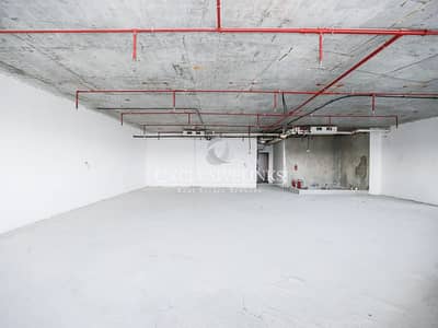 Office for Rent in Motor City, Dubai - Shell & Core Office with Race Track Views