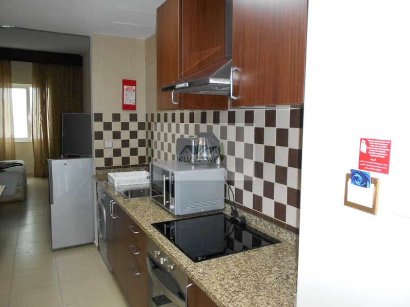 11 FIVE STAR FURNISHED STUDIO CLOSE TO SHARAF DG METRO WITH POOL GYM IN 40K