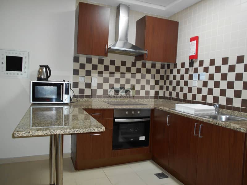 12 FIVE STAR FURNISHED STUDIO CLOSE TO SHARAF DG METRO WITH POOL GYM IN 40K