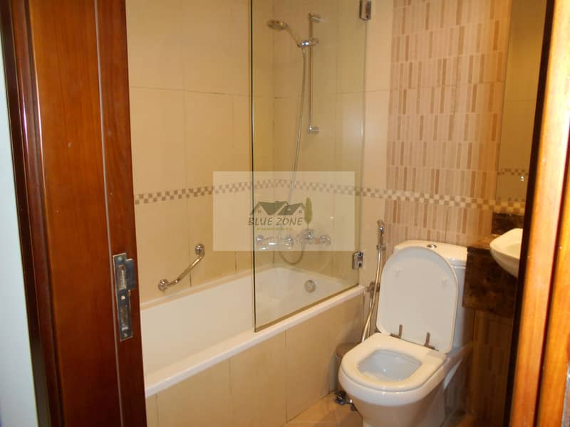 13 FIVE STAR FURNISHED STUDIO CLOSE TO SHARAF DG METRO WITH POOL GYM IN 40K