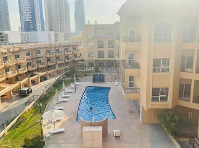 1 Bedroom Flat for Rent in Jumeirah Village Circle (JVC), Dubai - Pool View 1 BHK | Massive Balcony | Cheap Rent