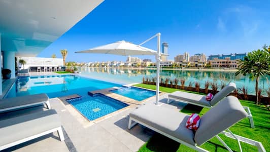 فیلا 8 غرف نوم للبيع في نخلة جميرا، دبي - Exclusive Custom-Built Beachfront Villa