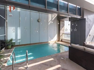 4 Bedroom Penthouse for Sale in Business Bay, Dubai - Private Pool | Massive Terrace | Canal Views