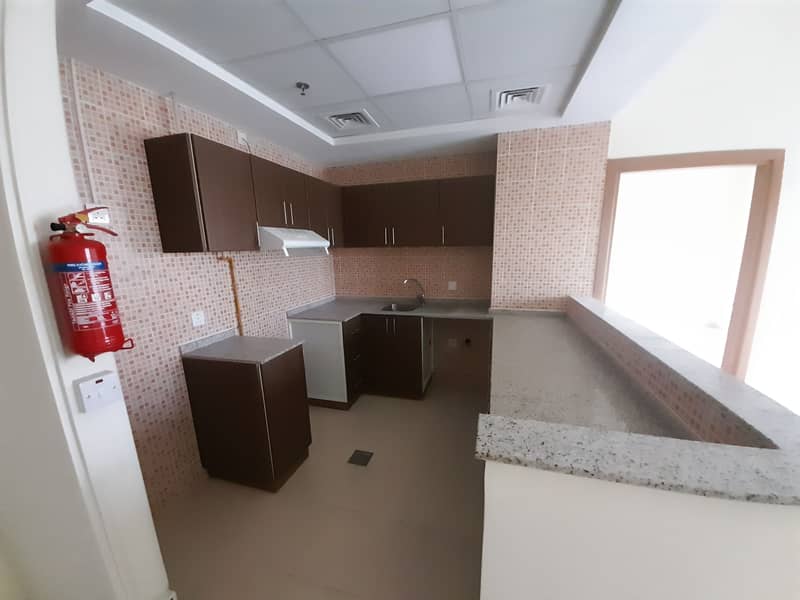 Spacious 1bhk apartment just 30k with one month free with GYM AND POOL with all facilities with open view in Dubai land wadi al saffa 5.